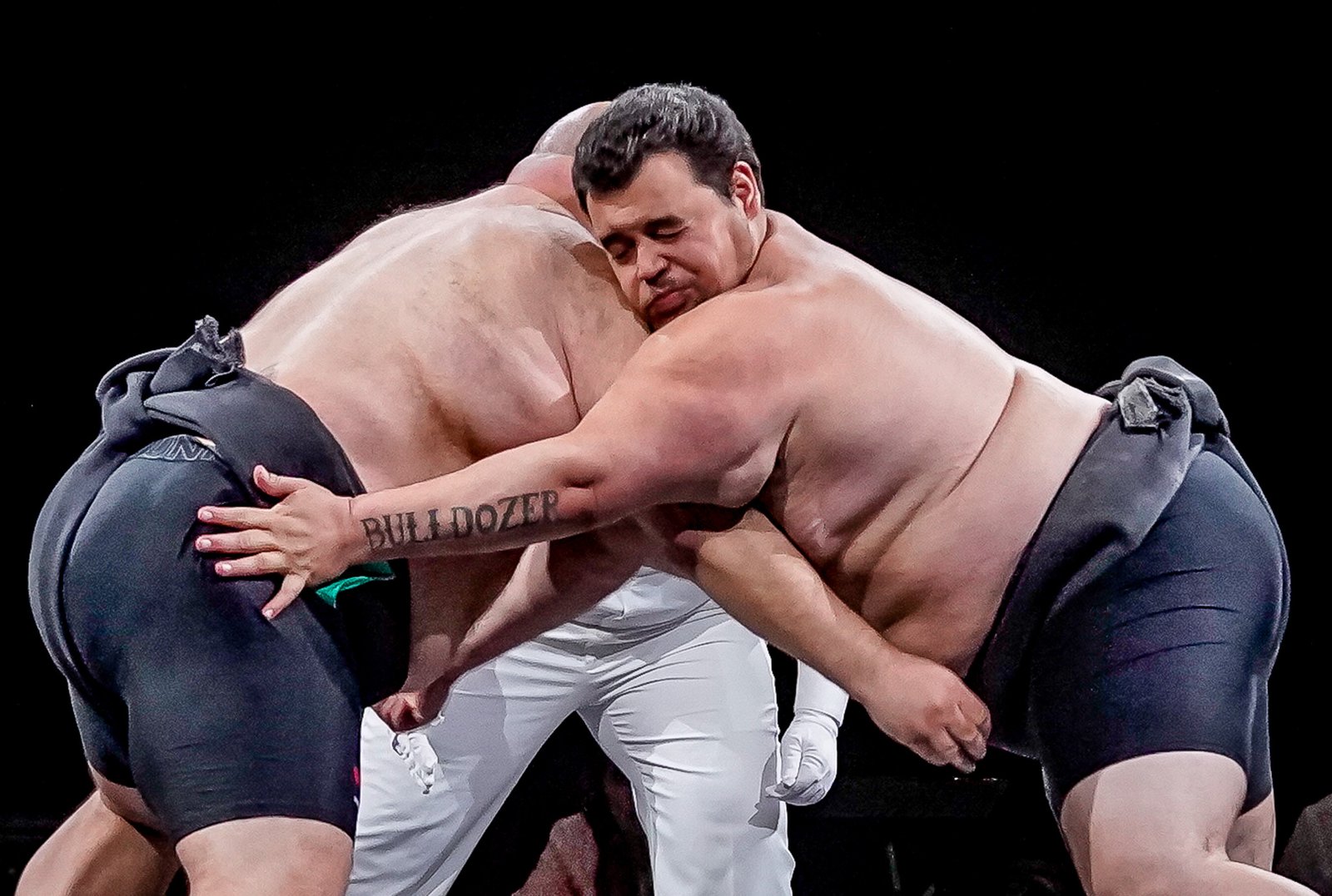 Two WES athletes locked in competition inside the ring